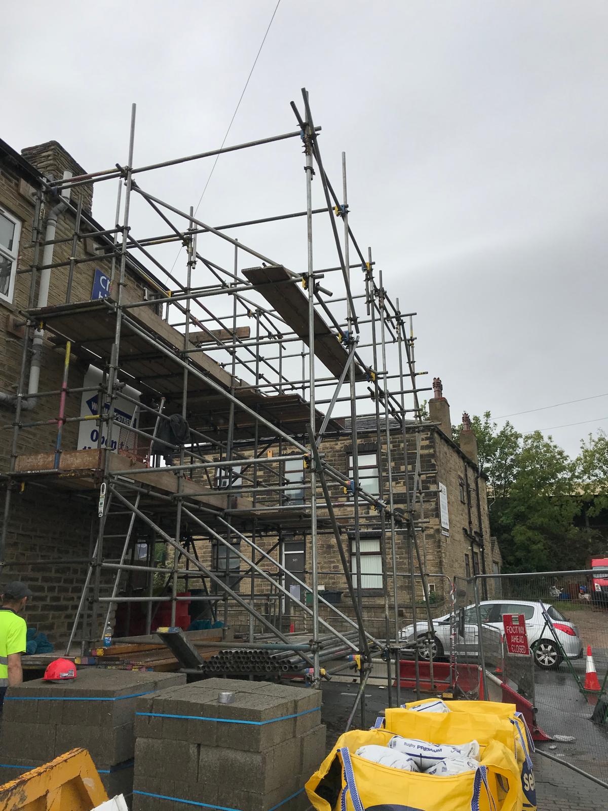 Emergency response and full stone-built façade rebuild after a vehicle collided with the front elevation. Independent scaffold to the full height of the property with pedestrian footway closure and council-permitted traffic management.
